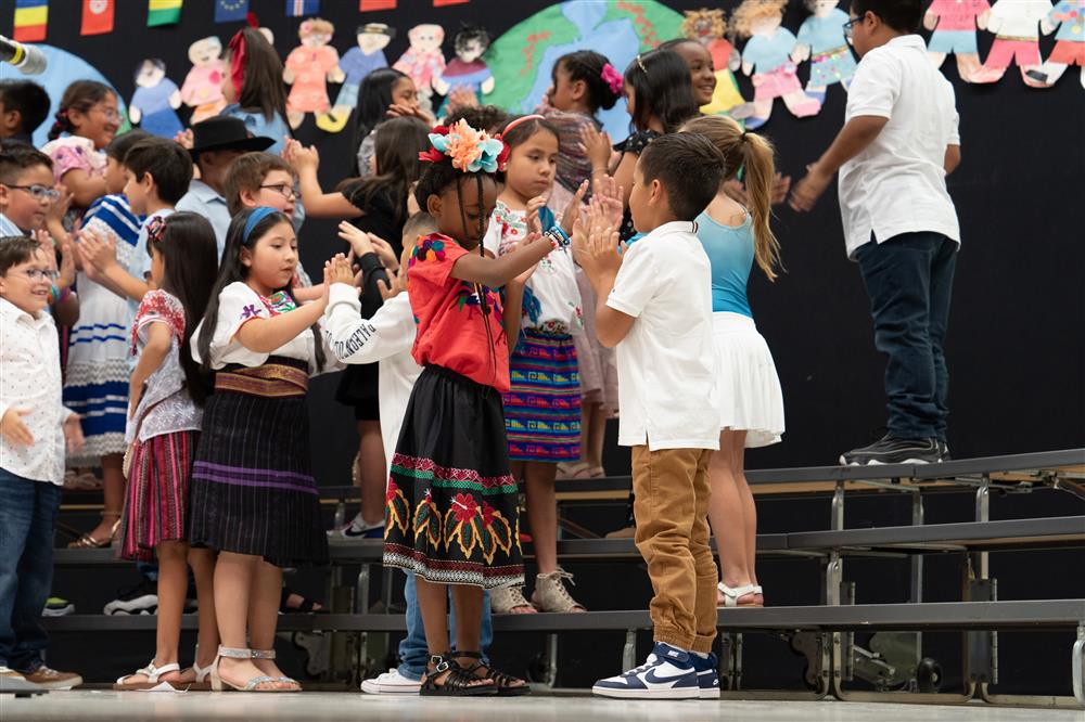 Students celebrate their diverse cultures and backgrounds during Bologna Elementary School's Celebration of Nations assembly.